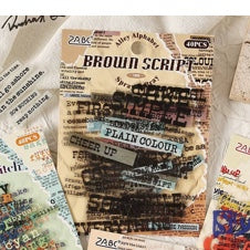 ملصقات صغيرة brown script